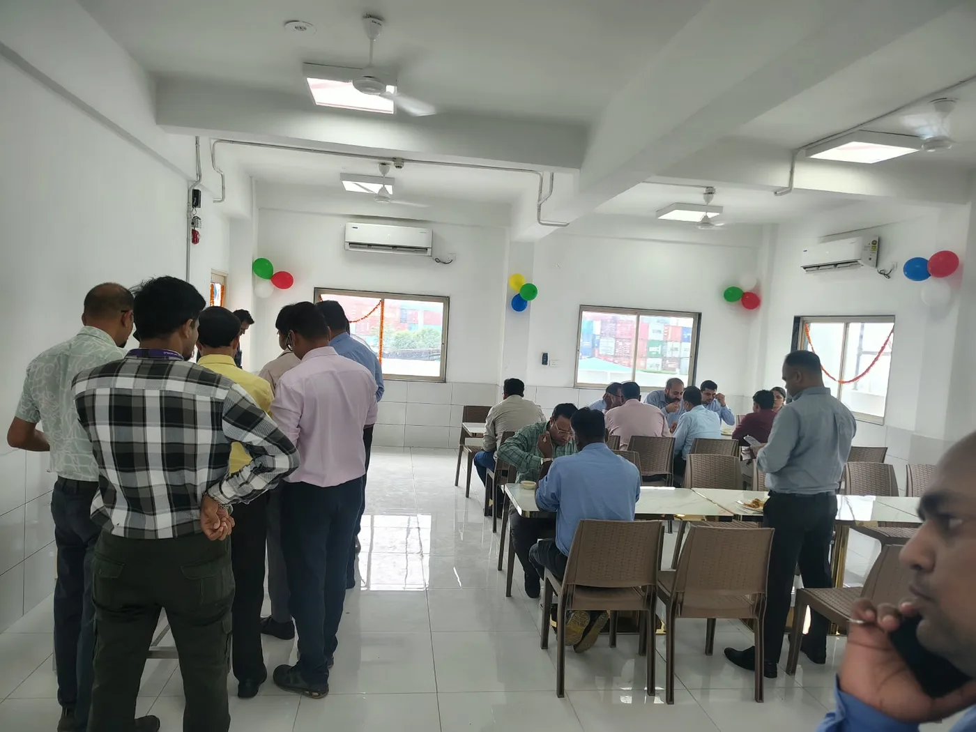 Team gathered at the inauguration of a new site cafeteria