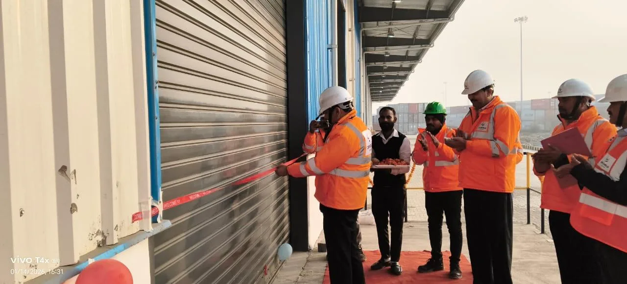 Ribbon-cutting ceremony at a completed warehouse facility
