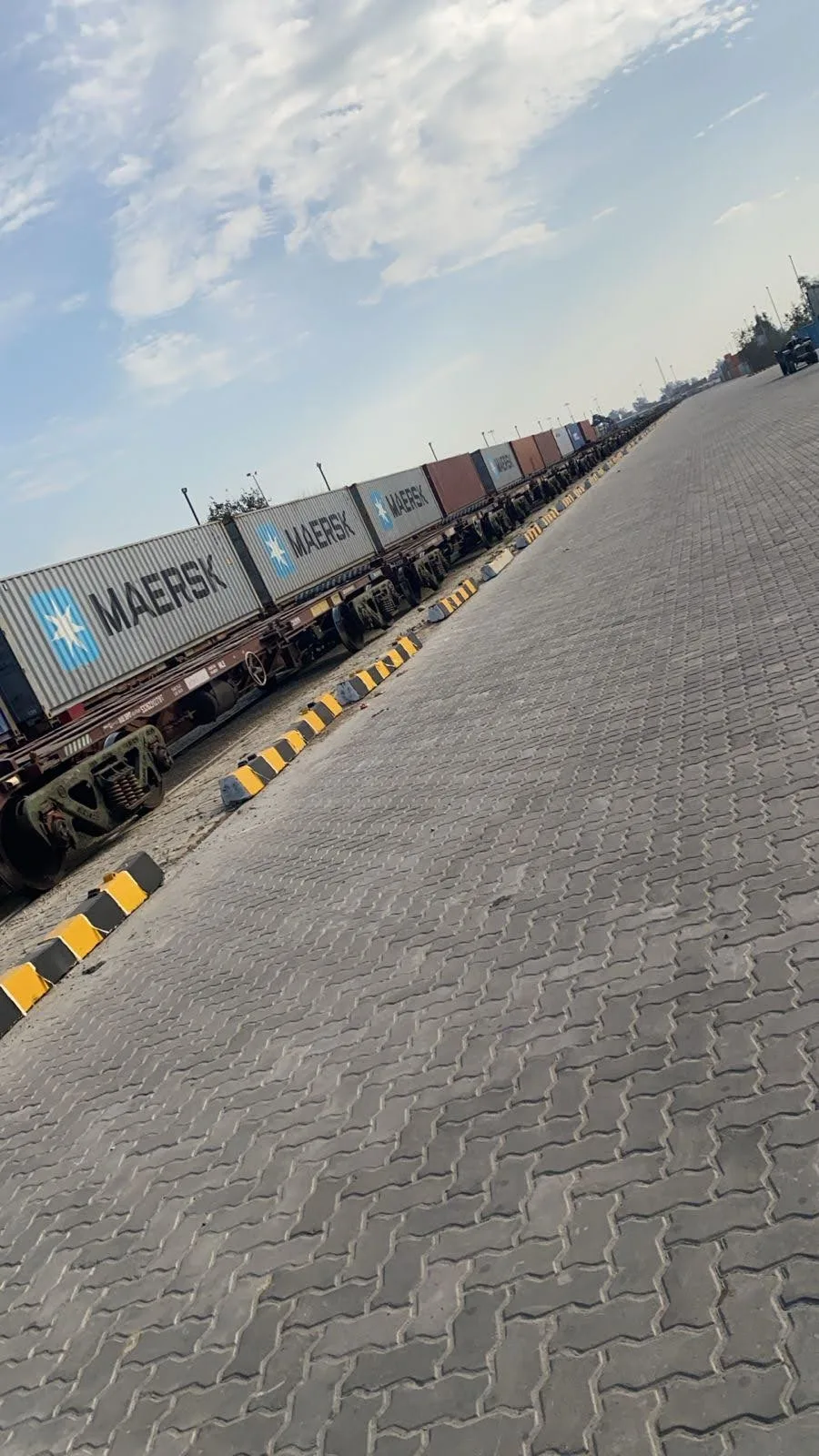 Paved yard beside a container rake at the Nagpur ICD