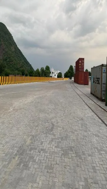 Paved apron alongside a terminal structure